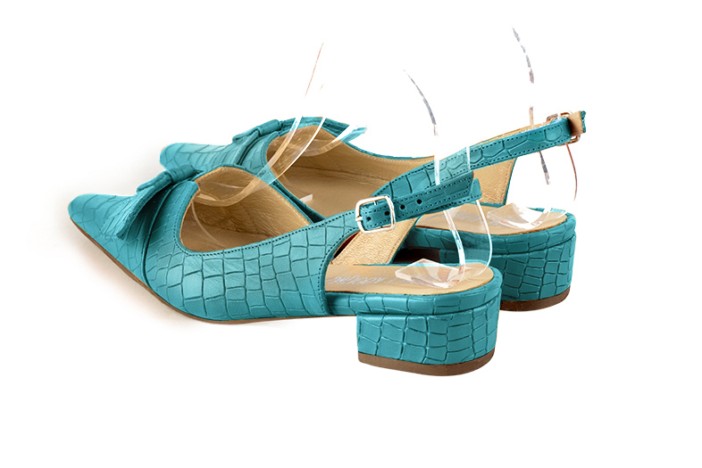 Women's  elegant slingback heels. .  - Rear view